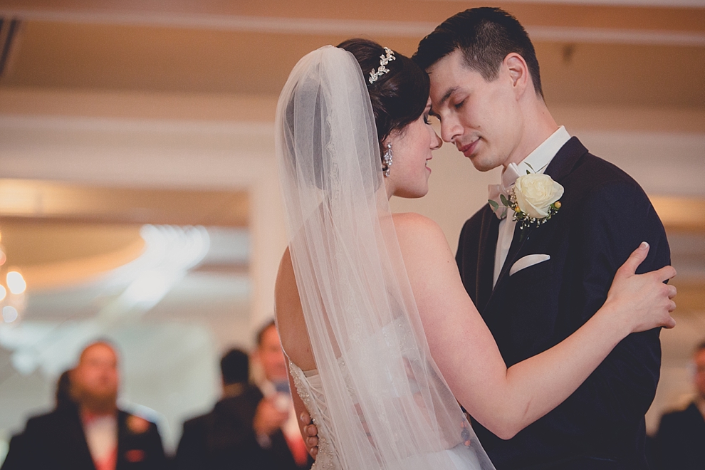 bride and groom share first dance during wedding reception at Samuel's Grande Manor near Buffalo, NY