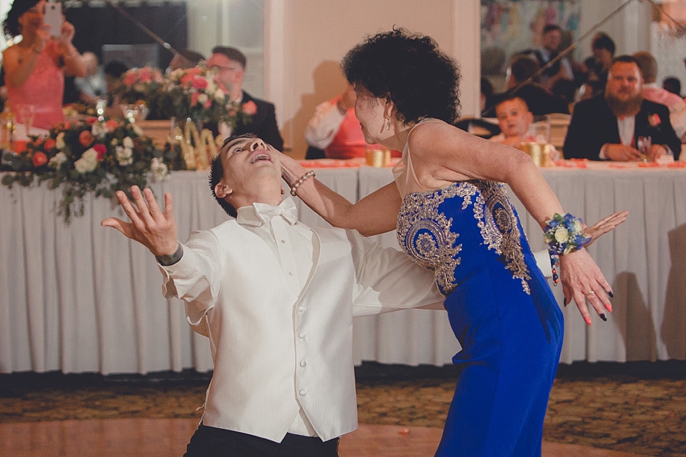 groom dances with mother during wedding reception at Samuel's Grande Manor near Buffalo, NY