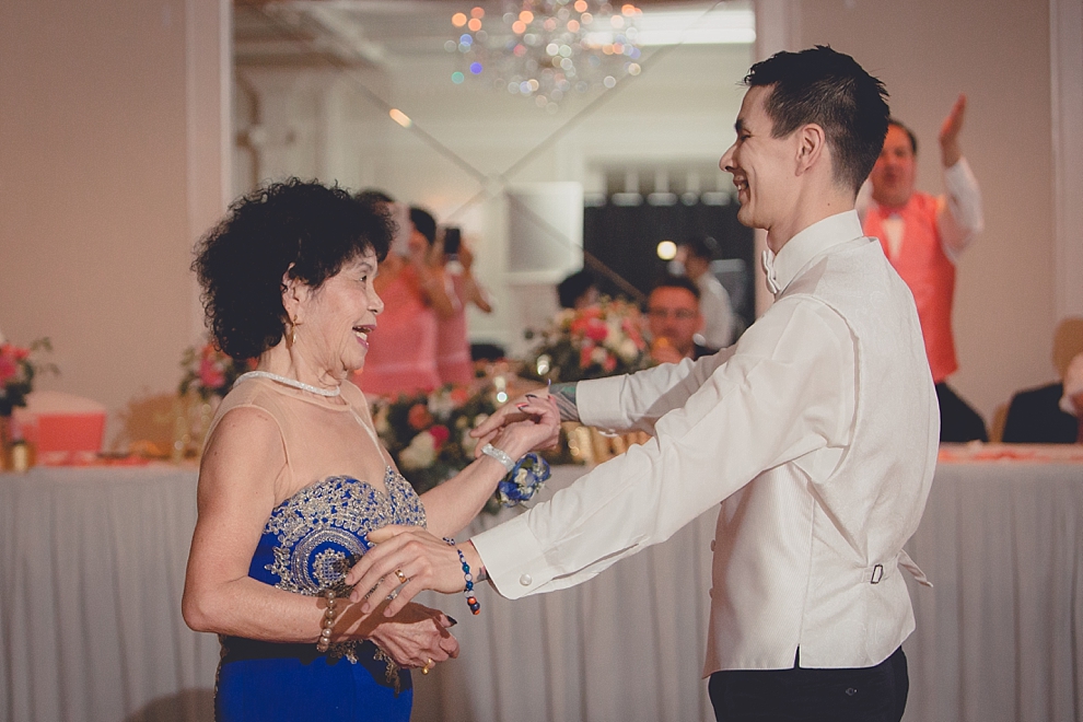 groom dances with mother during wedding reception at Samuel's Grande Manor near Buffalo, NY