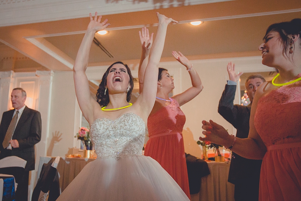 bride sings and dances during wedding reception at Samuel's Grande Manor near Buffalo, NY