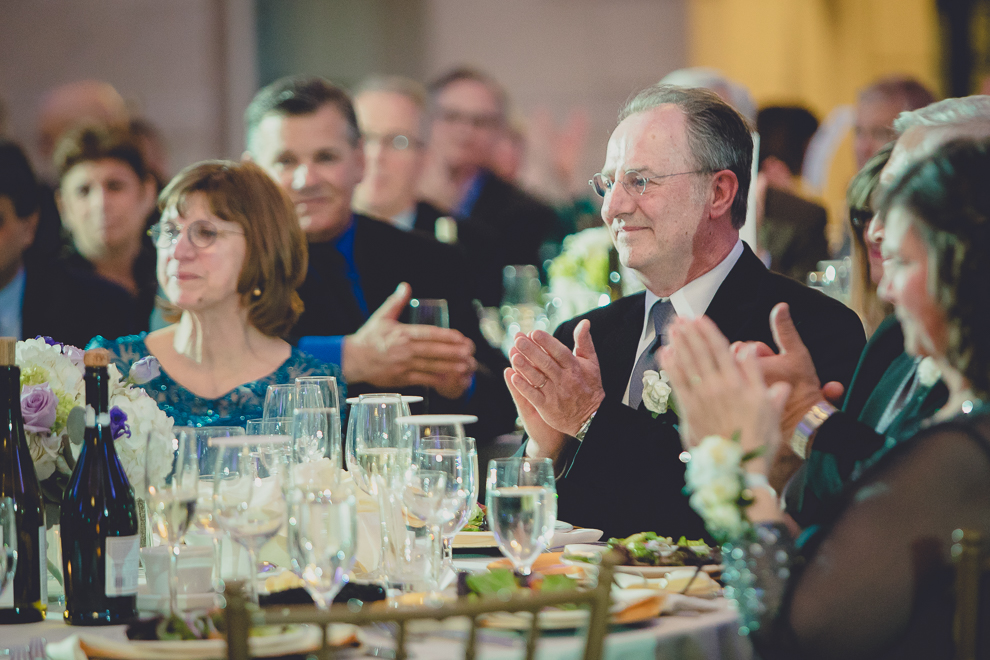 guests clap for bride and groom at ballroom wedding reception venue, the Admiral Room, in Buffalo, NY