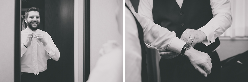 groom puts on watch and tie before wedding at Marriott Hotel in Buffalo, NY