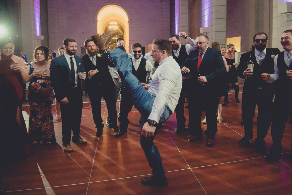 guests dance at ballroom wedding reception venue, the Admiral Room, in Buffalo, NY
