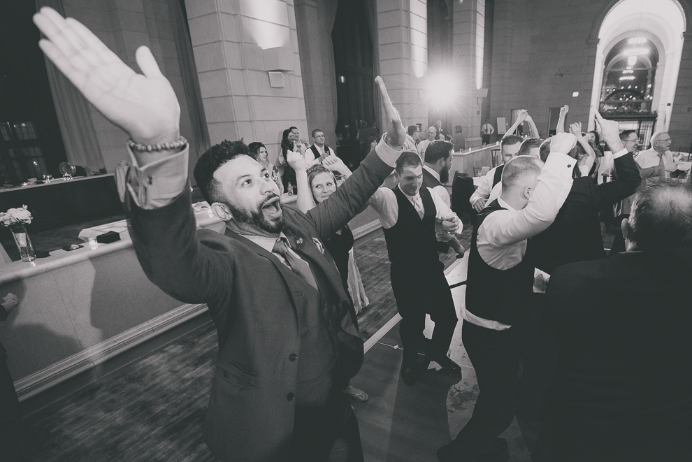 guests dance at ballroom wedding reception venue, the Admiral Room, in Buffalo, NY