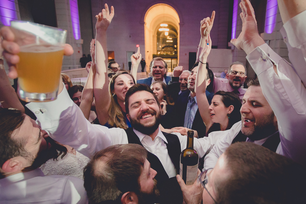 guests dance at ballroom wedding reception venue, the Admiral Room, in Buffalo, NY