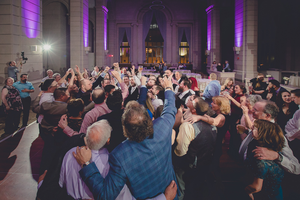 guests dance at ballroom wedding reception venue, the Admiral Room, in Buffalo, NY