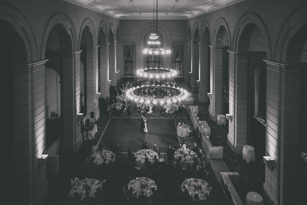 bride and groom dance during speech at ballroom wedding reception venue, the Admiral Room, in Buffalo, NY