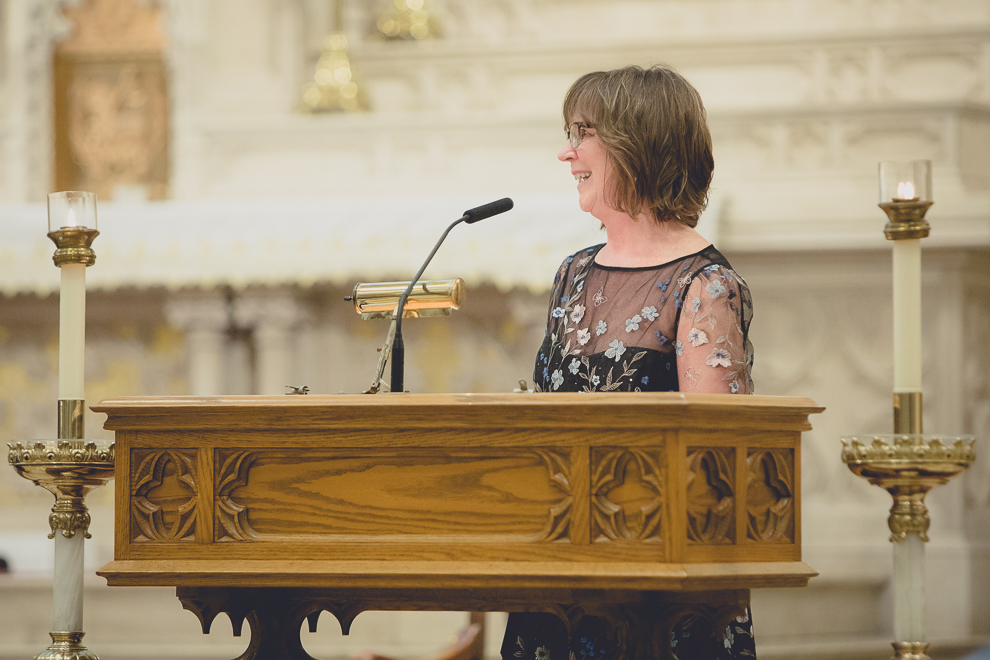 guest gives reading during wedding ceremony at St. Louis Church in Buffalo, NY