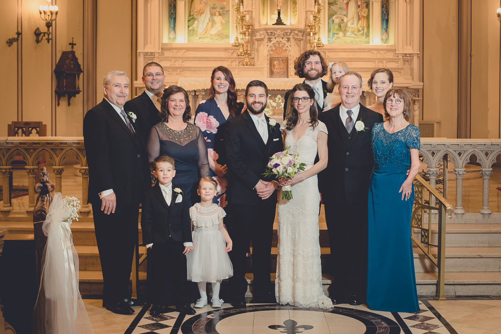 family portraits during wedding ceremony at St. Louis Church in Buffalo, NY