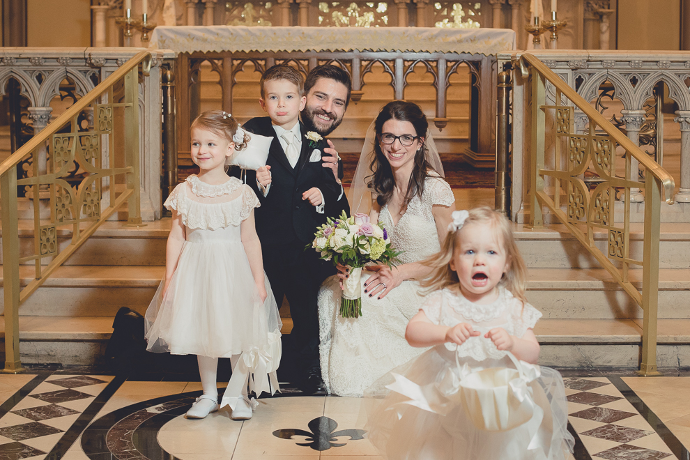 family portraits during wedding ceremony at St. Louis Church in Buffalo, NY
