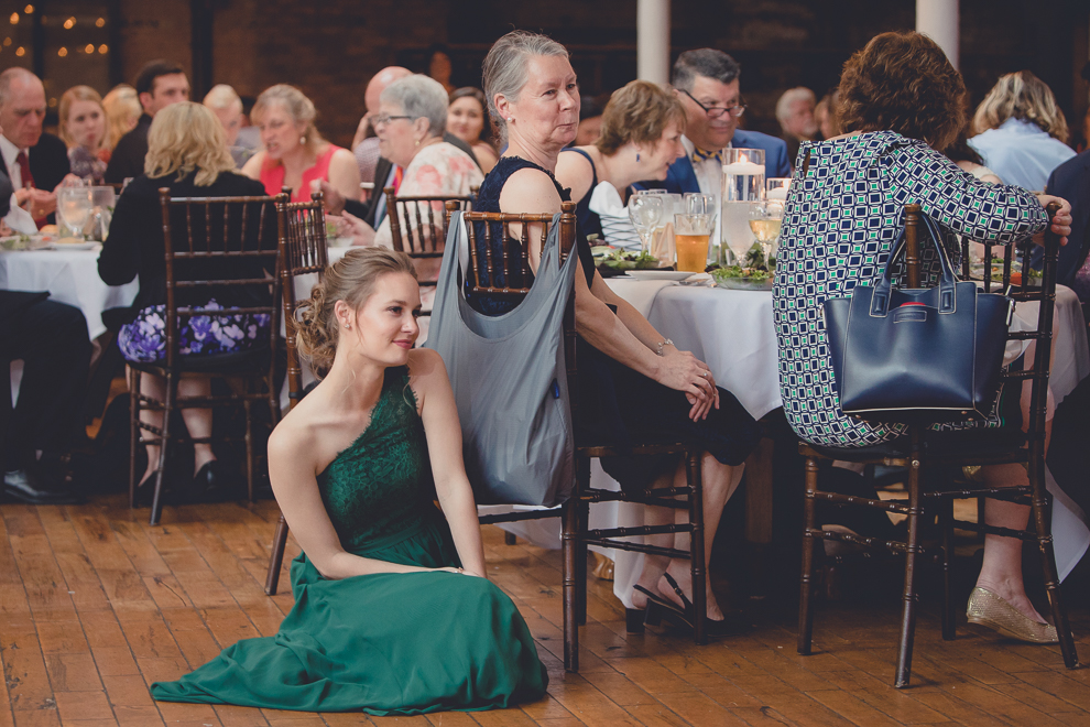 guests watch as bride and groom dance during wedding reception in Hotel Lafayette in Buffalo, NY
