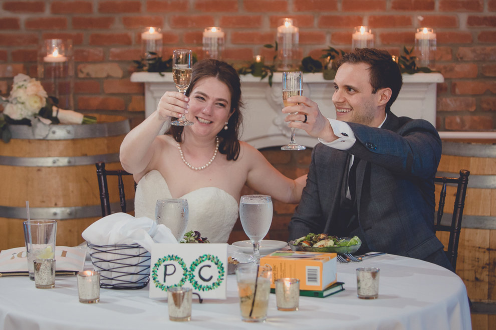 bride and groom toast during wedding reception in Hotel Lafayette in Buffalo, NY