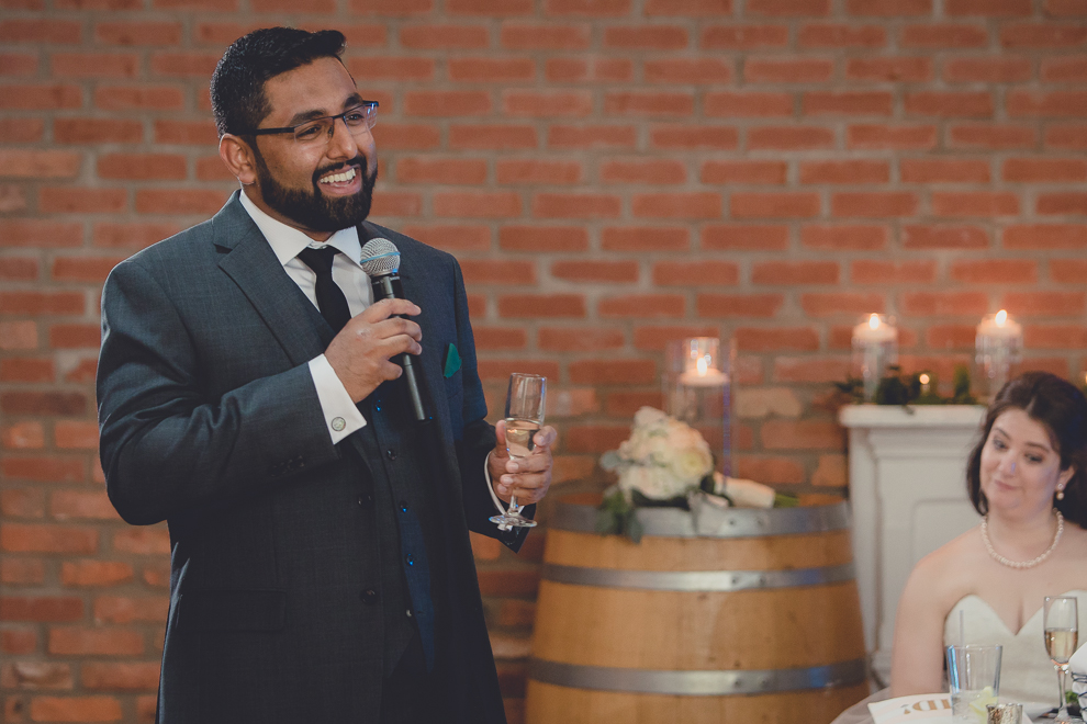 best man delivers speech during wedding reception in Hotel Lafayette in Buffalo, NY
