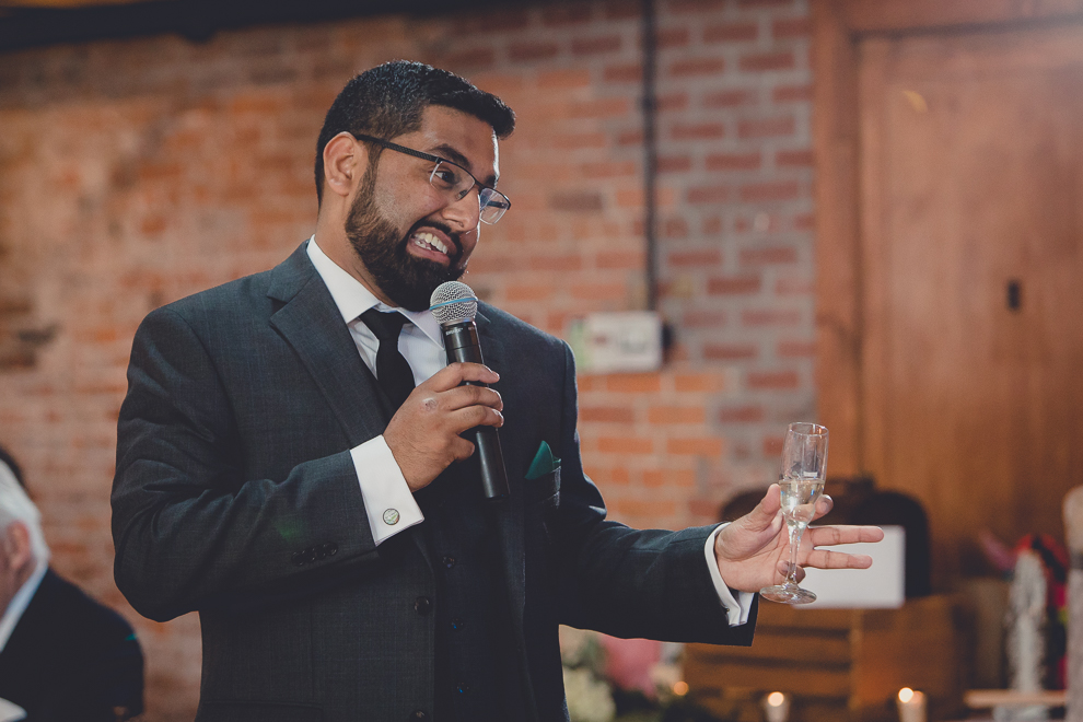 best man delivers toast during wedding reception in Hotel Lafayette in Buffalo, NY