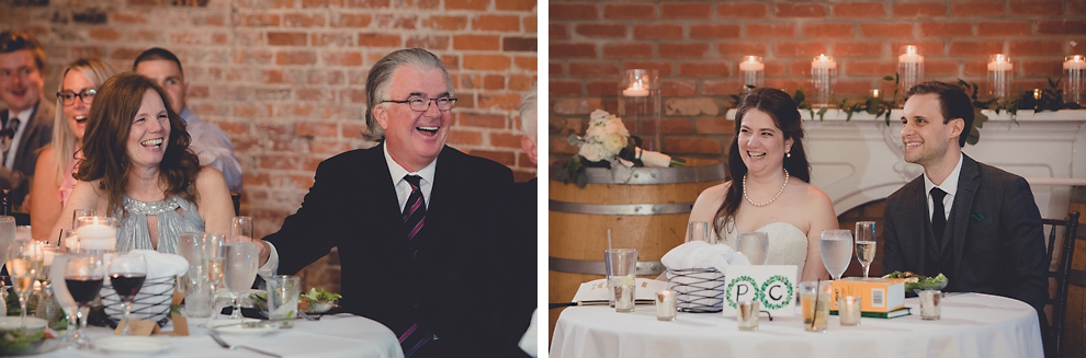 bride, groom and guests laugh during speech during wedding reception in Hotel Lafayette in Buffalo, NY