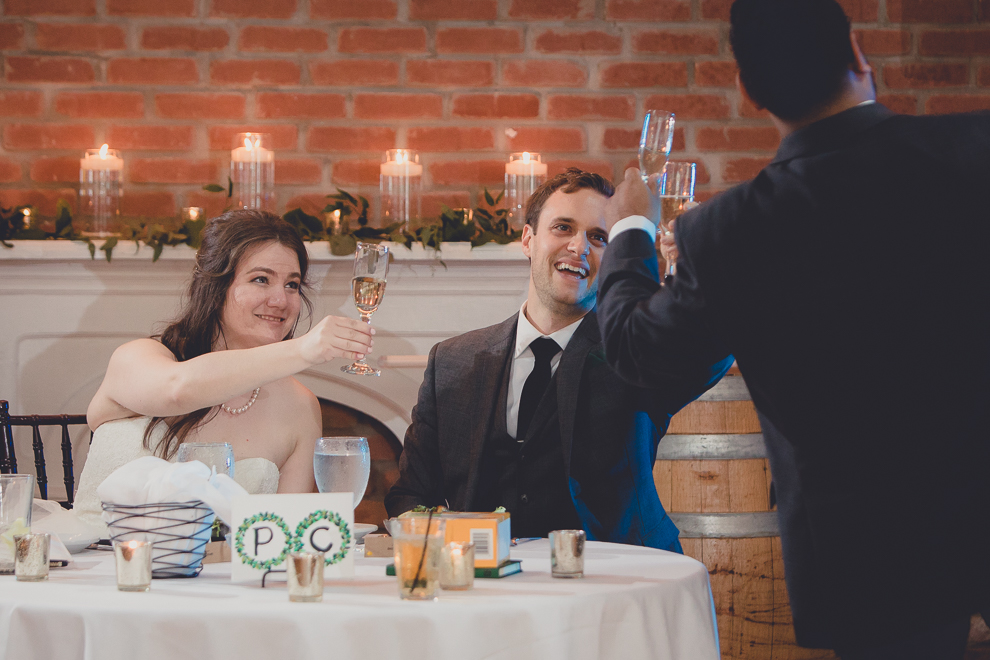 bride, groom and best man toast during wedding reception in Hotel Lafayette in Buffalo, NY