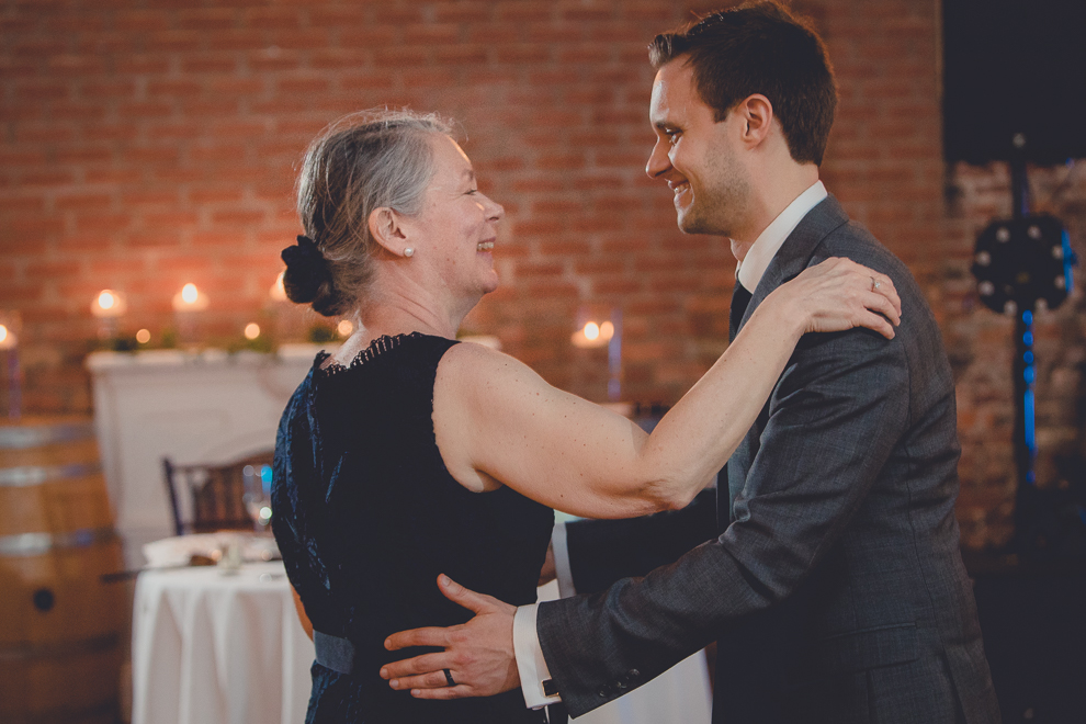 groom and mother dance during wedding reception in Hotel Lafayette in Buffalo, NY