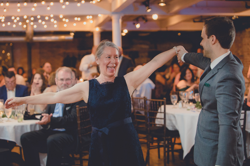 groom and mother dance during wedding reception in Hotel Lafayette in Buffalo, NY