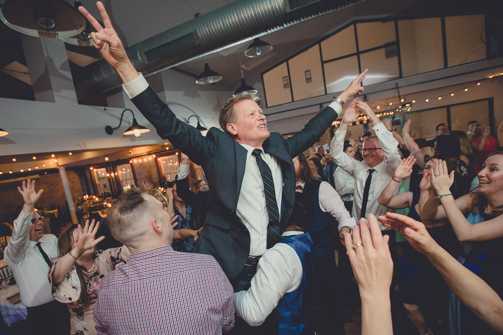 guests dance during wedding reception in Hotel Lafayette in Buffalo, NY