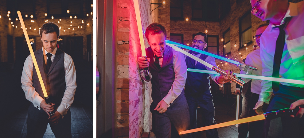 groom and groomsmen pose with star wars light during wedding reception in Hotel Lafayette in Buffalo, NY
