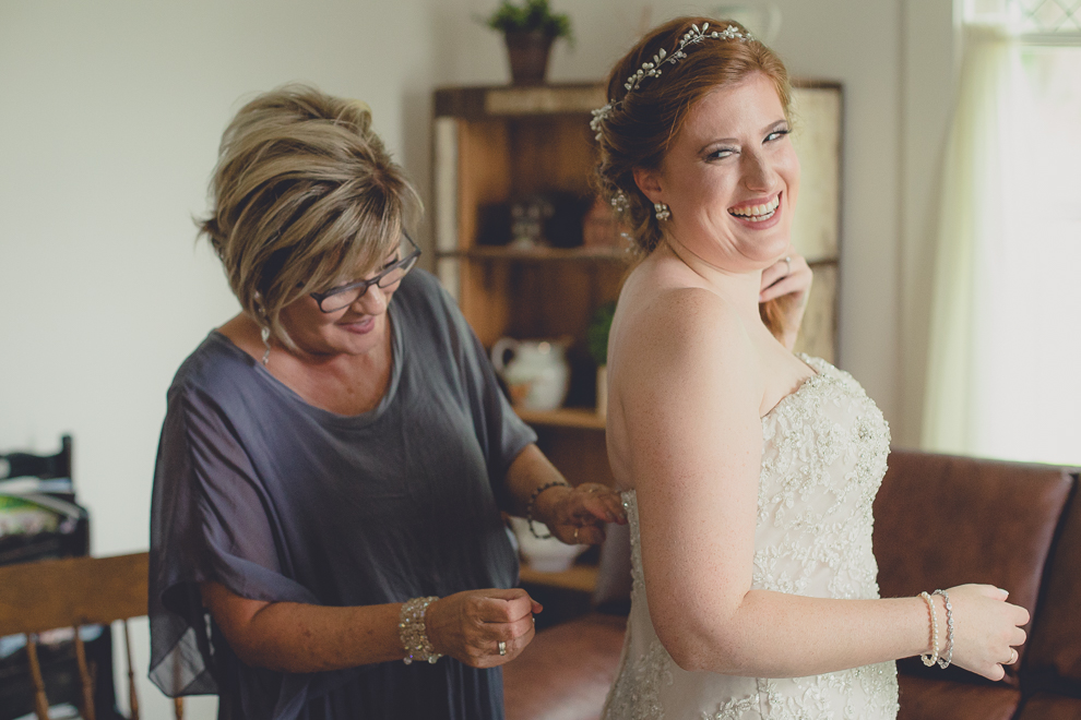 brides getting ready in cottage at a Hayloft in the Grove wedding in East Aurora, near Buffalo, NY
