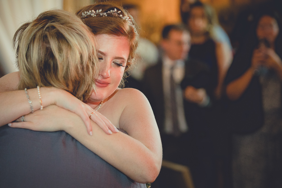 bride and mom dance at wedding reception in barn at a Hayloft in the Grove in East Aurora, near Buffalo, NY