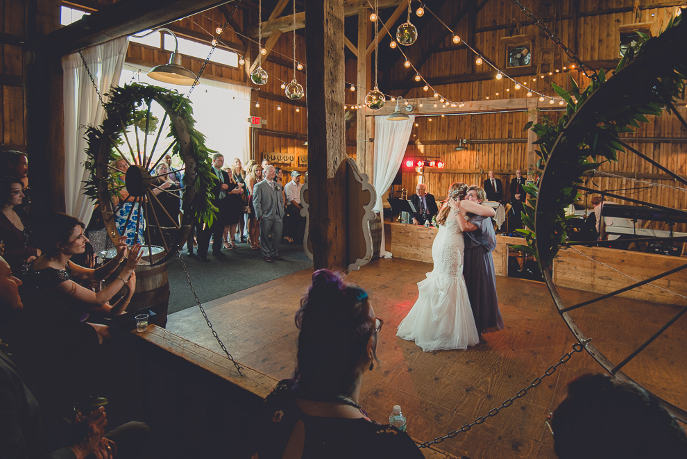 bride and mom dance at wedding reception in barn at a Hayloft in the Grove in East Aurora, near Buffalo, NY