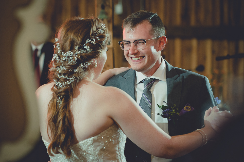 bride and brother dance at wedding reception in barn at a Hayloft in the Grove in East Aurora, near Buffalo, NY