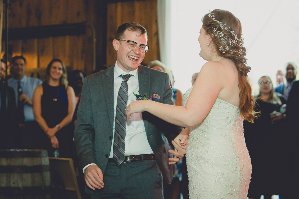 bride and brother dance at wedding reception in barn at a Hayloft in the Grove in East Aurora, near Buffalo, NY