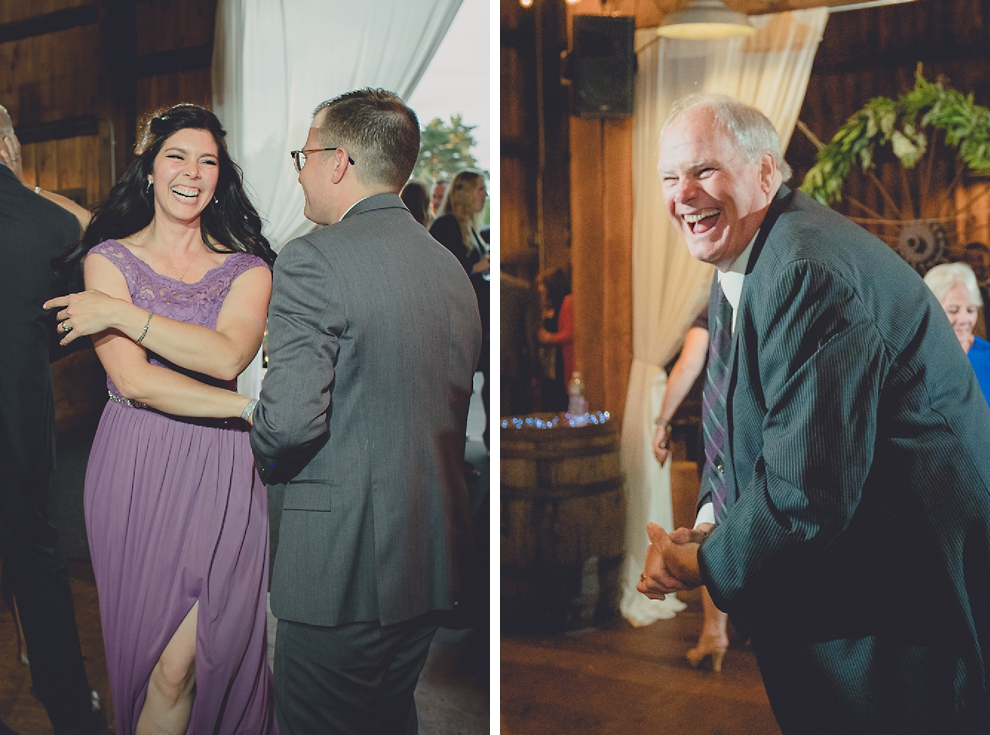guests dance at wedding reception in barn at a Hayloft in the Grove in East Aurora, near Buffalo, NY