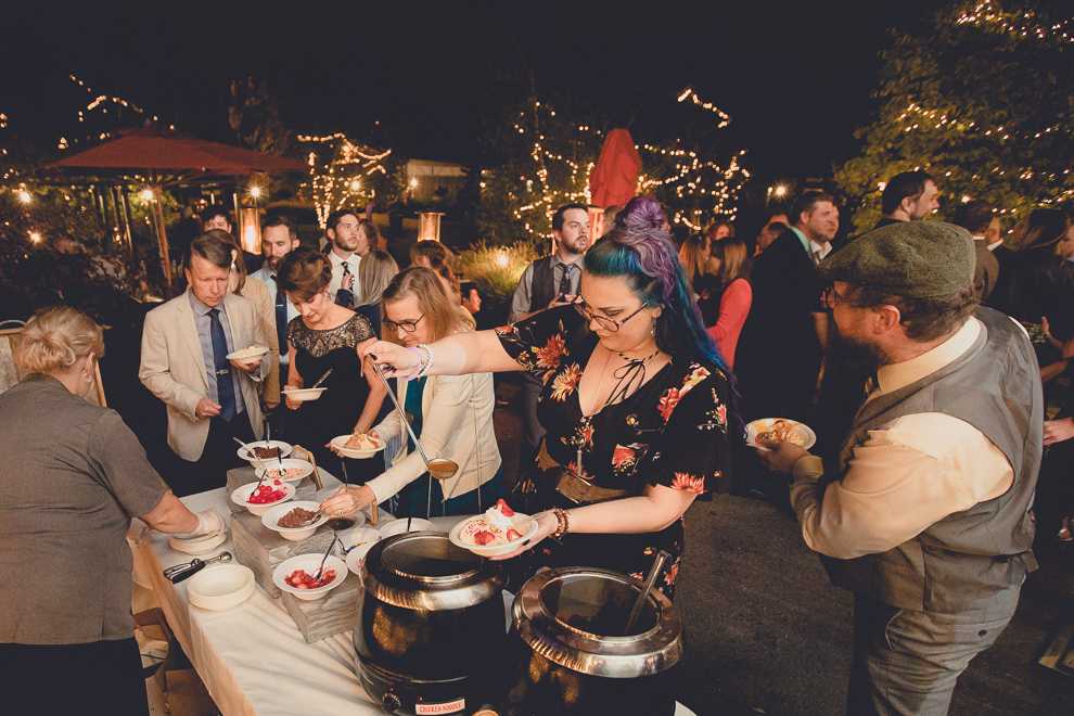 guests enjoy ice cream bar at wedding reception in barn at a Hayloft in the Grove in East Aurora, near Buffalo, NY
