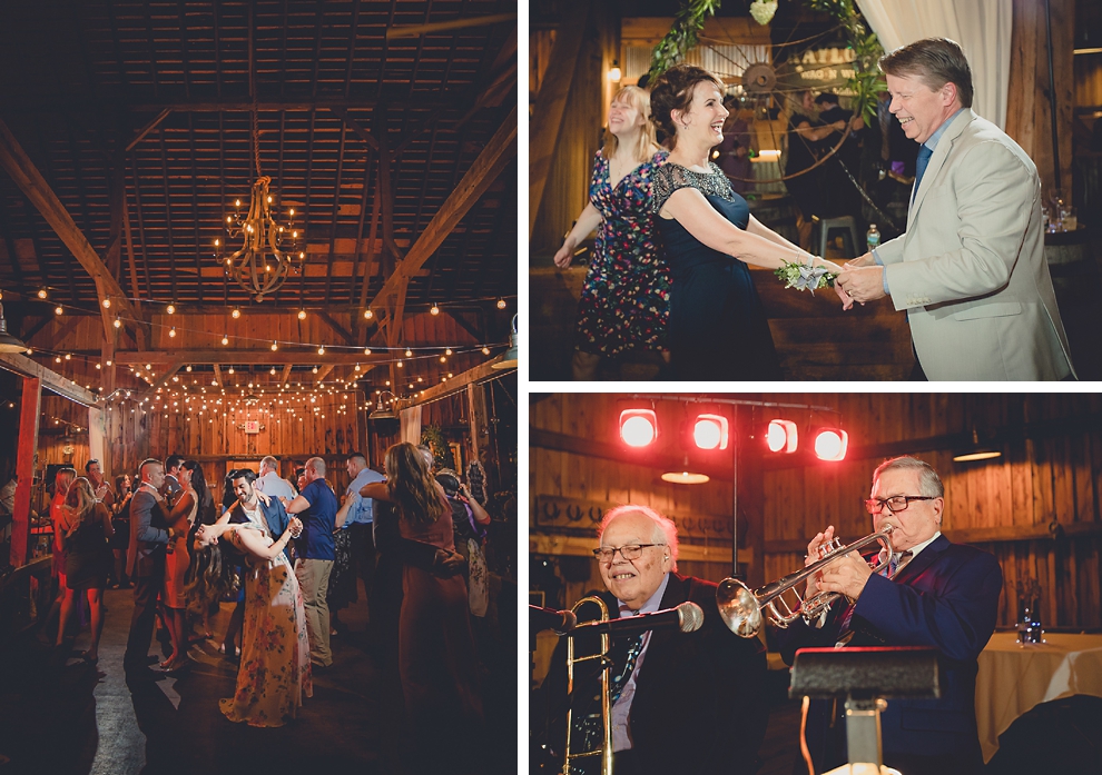 guests dance at wedding reception in barn at a Hayloft in the Grove in East Aurora, near Buffalo, NY