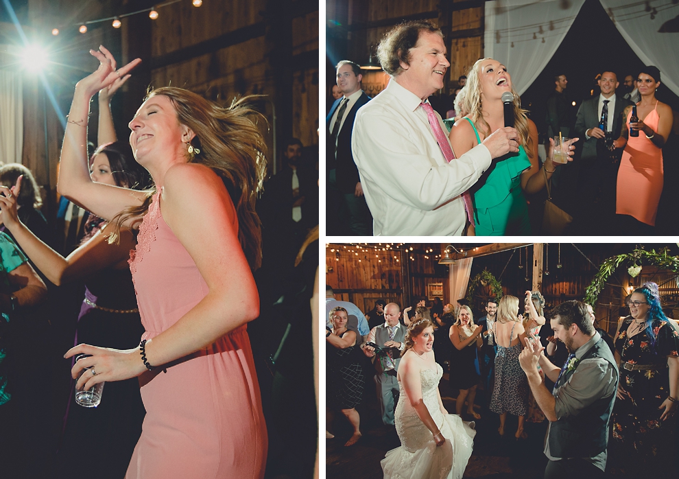 guests dance at wedding reception in barn at a Hayloft in the Grove in East Aurora, near Buffalo, NY