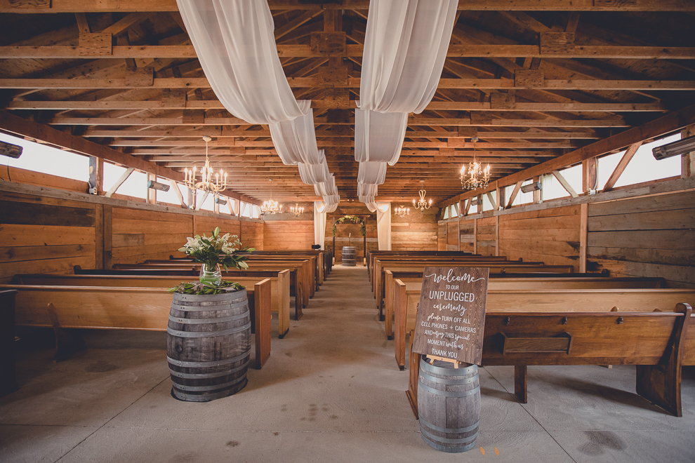wedding ceremony in converted stables at a Hayloft in the Grove wedding in East Aurora, near Buffalo, NY