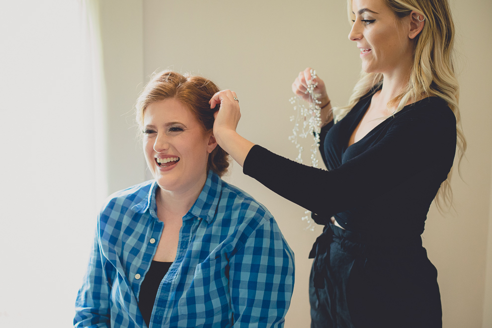 brides getting ready in cottage at a Hayloft in the Grove wedding in East Aurora, near Buffalo, NY