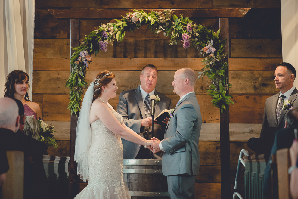 wedding ceremony in converted stables at a Hayloft in the Grove wedding in East Aurora, near Buffalo, NY