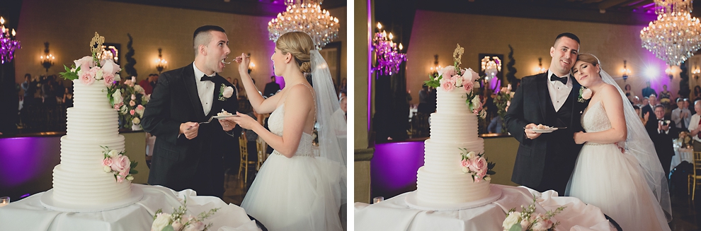 groom and bride feed each other cake in Terrace Room at the Statler City wedding reception venue in Buffalo, NY