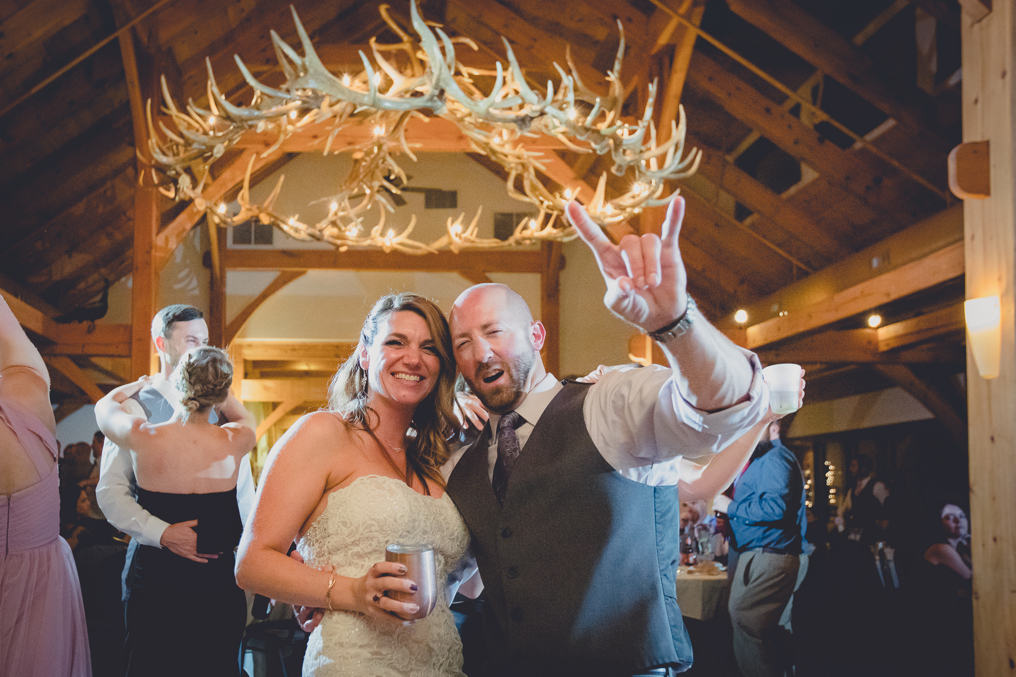 bride and groom dance in lodge at their wedding at hidden valley animal adventure near Buffalo, NY