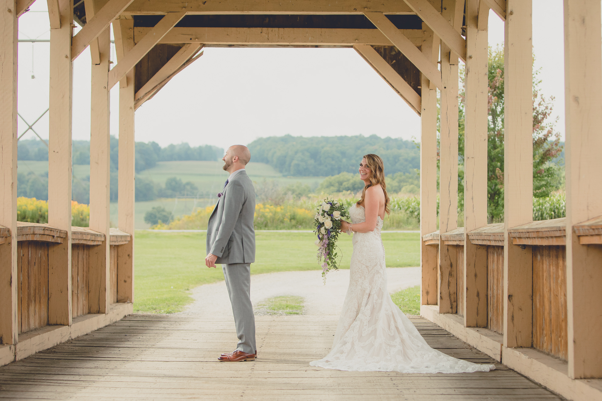 bride and groom have a first look or "reveal" before their wedding ceremony at hidden valley animal adventure near Buffalo, NY