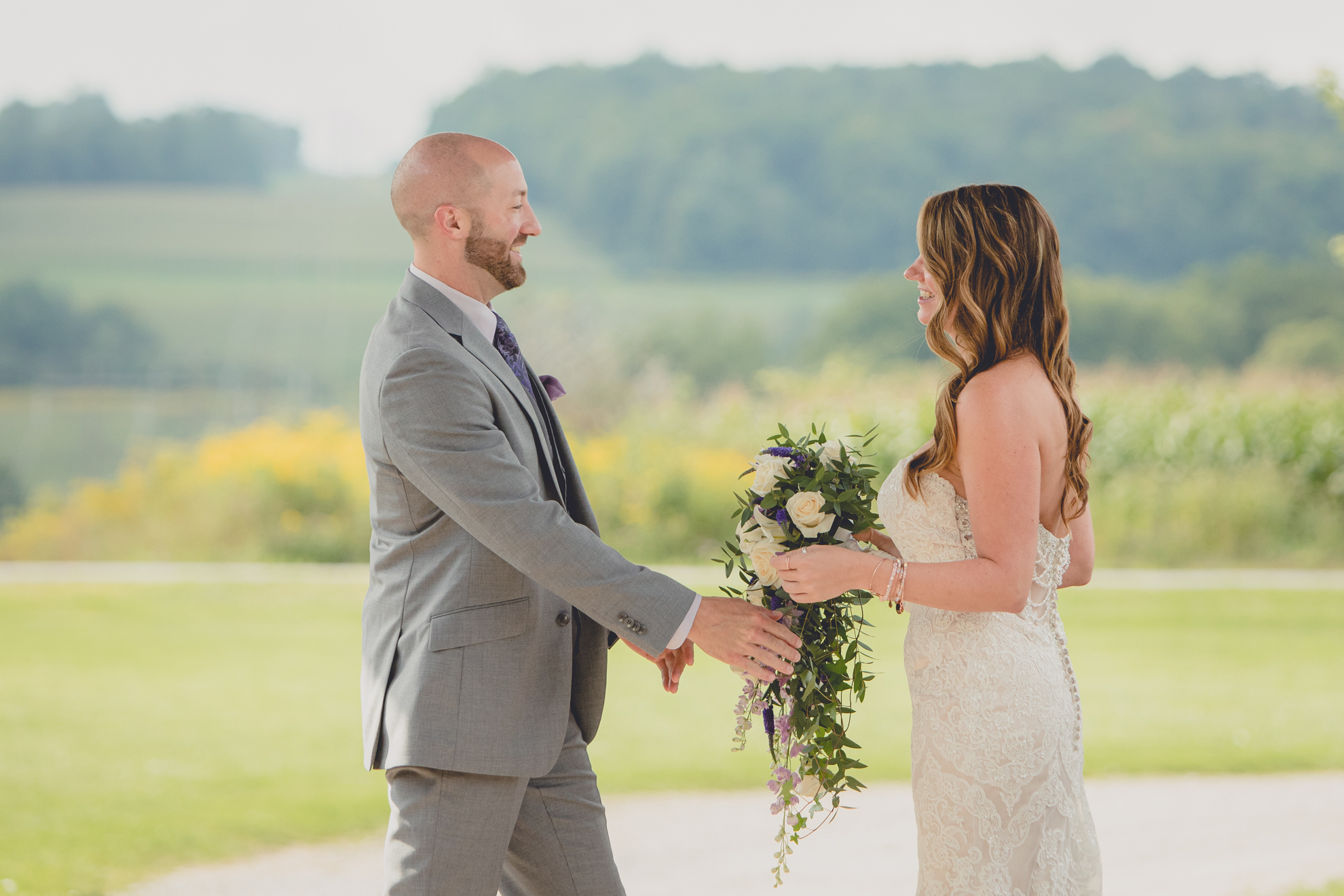 bride and groom have a first look or "reveal" before their wedding ceremony at hidden valley animal adventure near Buffalo, NY