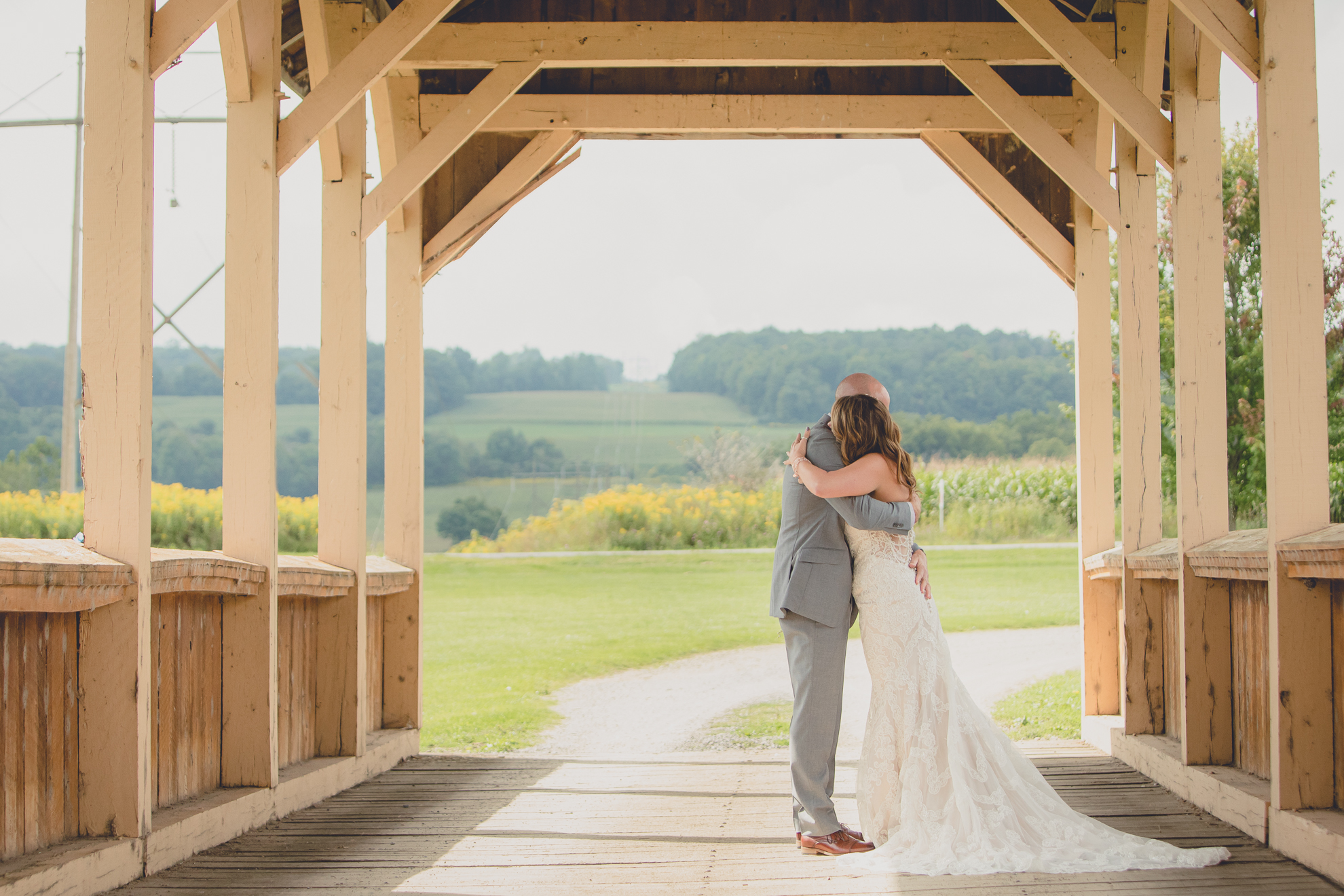 bride and groom have a first look or "reveal" before their wedding ceremony at hidden valley animal adventure near Buffalo, NY