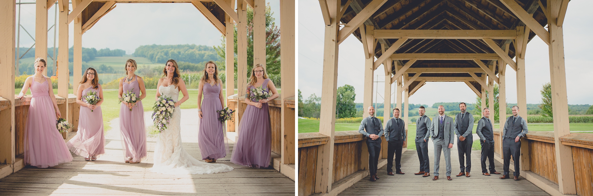 wedding party poses for portraits on covered bridge at wedding at hidden valley animal adventure near Buffalo, NY 