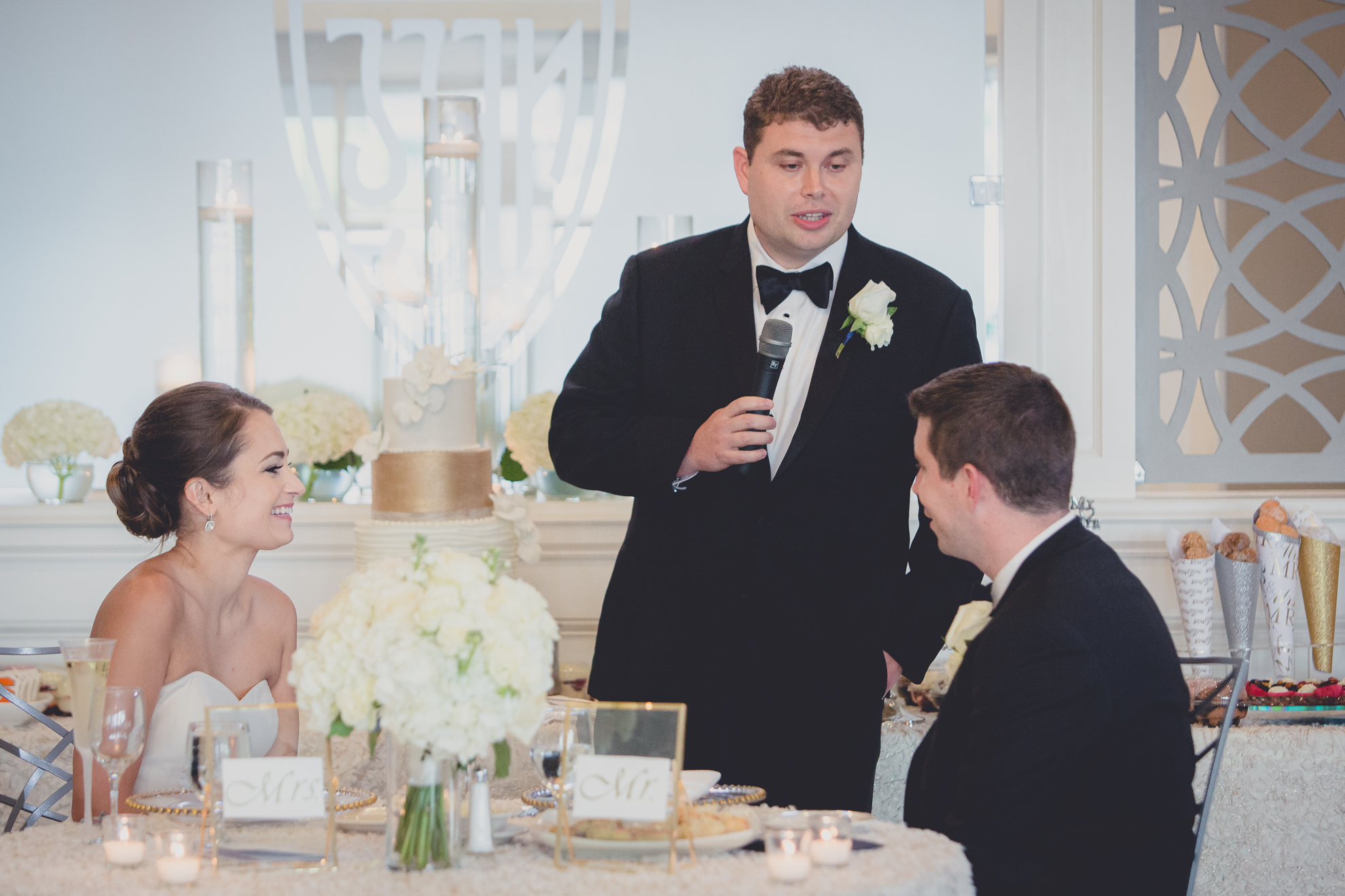 best man delivers speech at wedding reception at Niagara Falls Country Club in Lewiston, NY