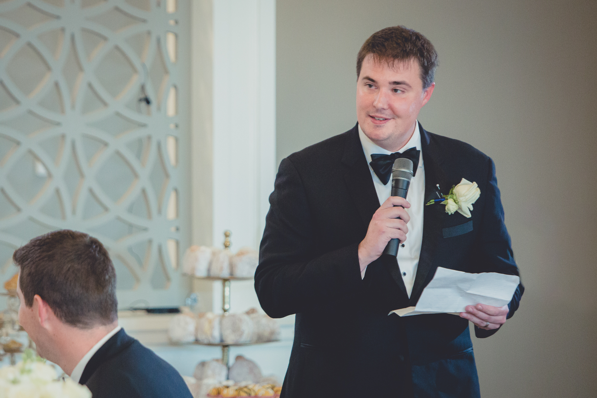 best man delivers speech at wedding reception at Niagara Falls Country Club in Lewiston, NY