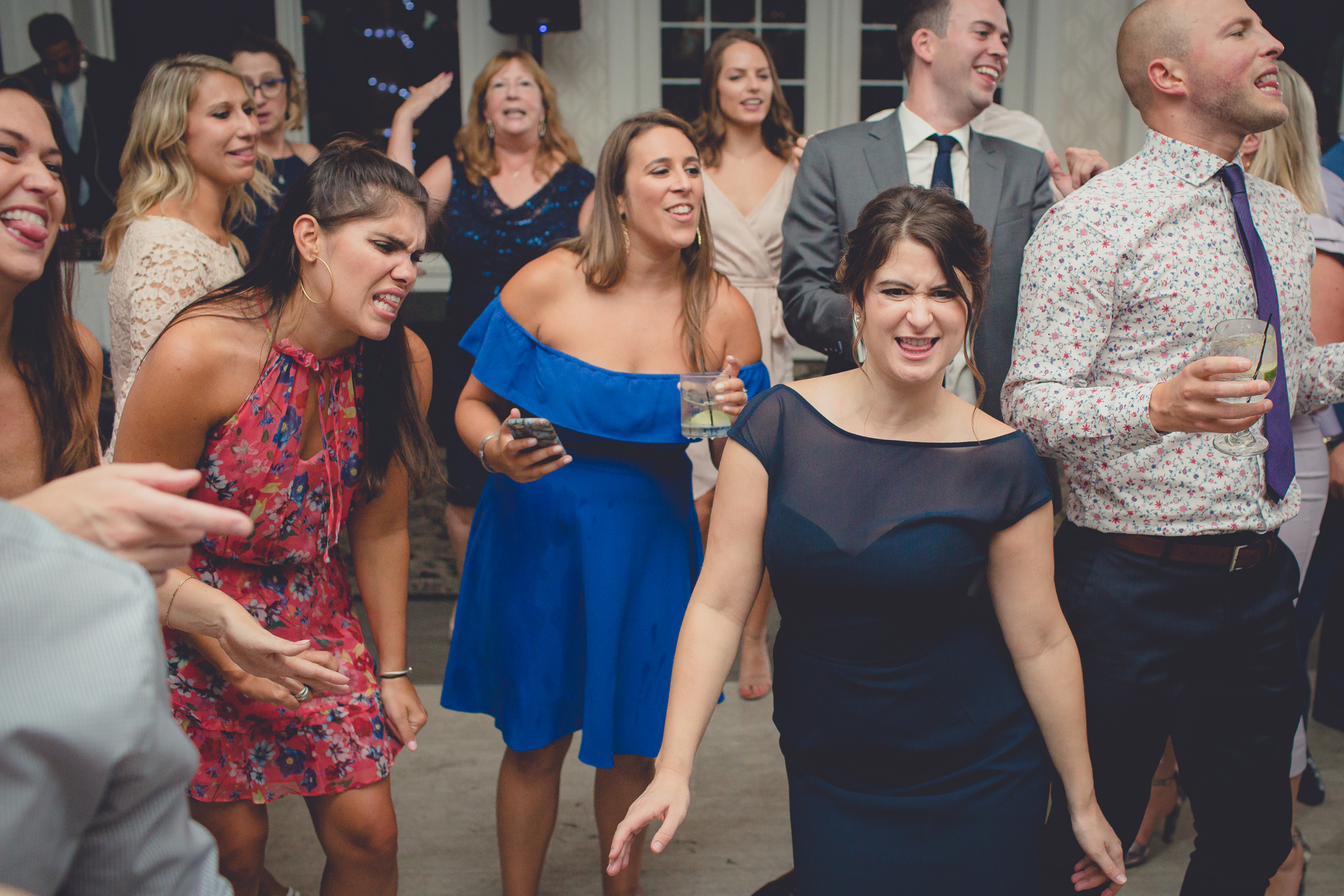guests dance at wedding reception at Niagara Falls Country Club in Lewiston, NY