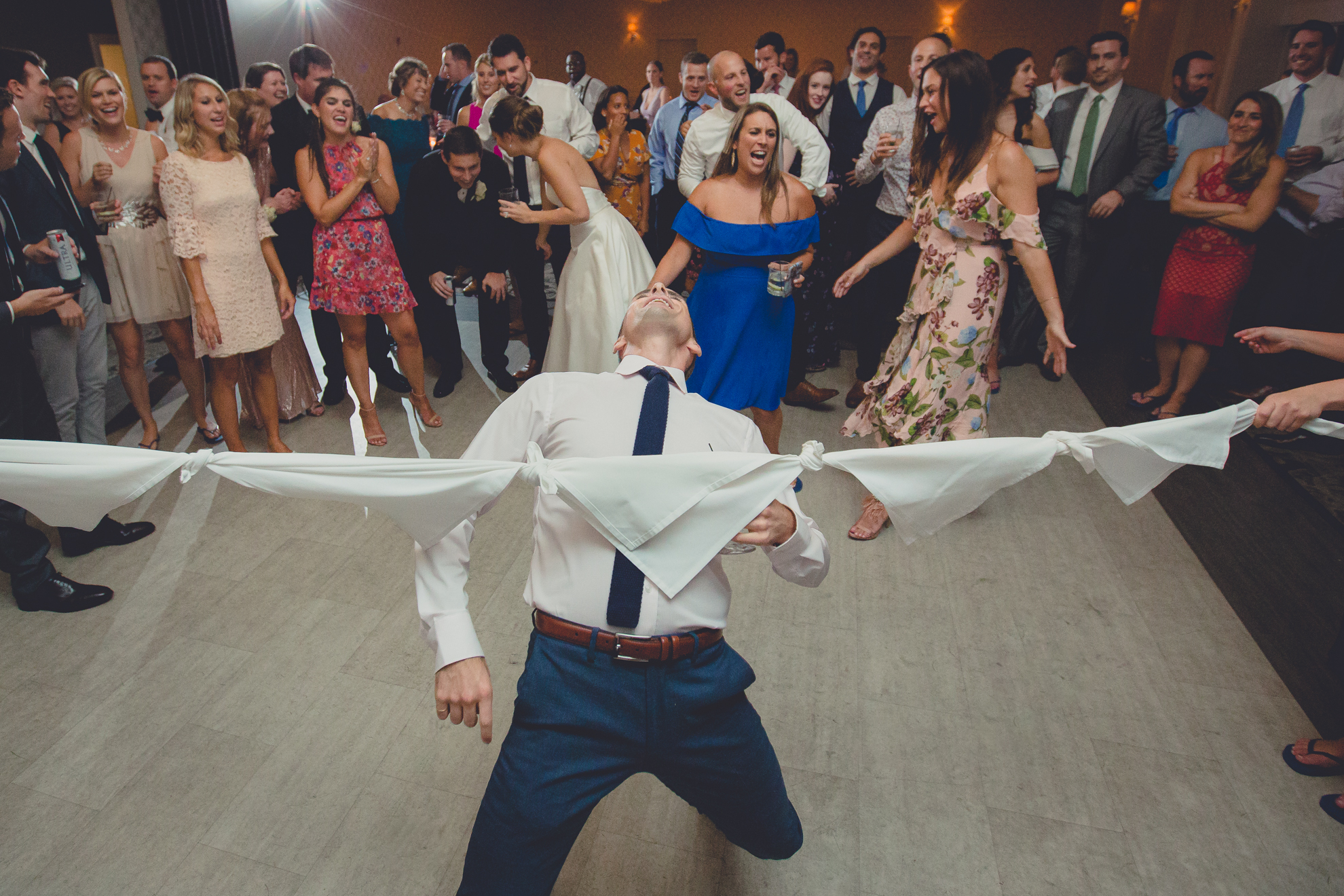 guests limbo at wedding reception at Niagara Falls Country Club in Lewiston, NY