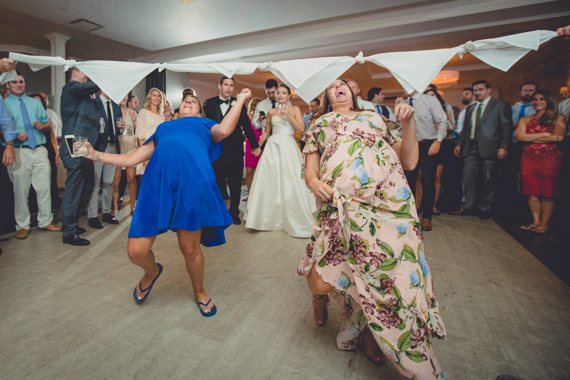 guests limbo at wedding reception at Niagara Falls Country Club in Lewiston, NY