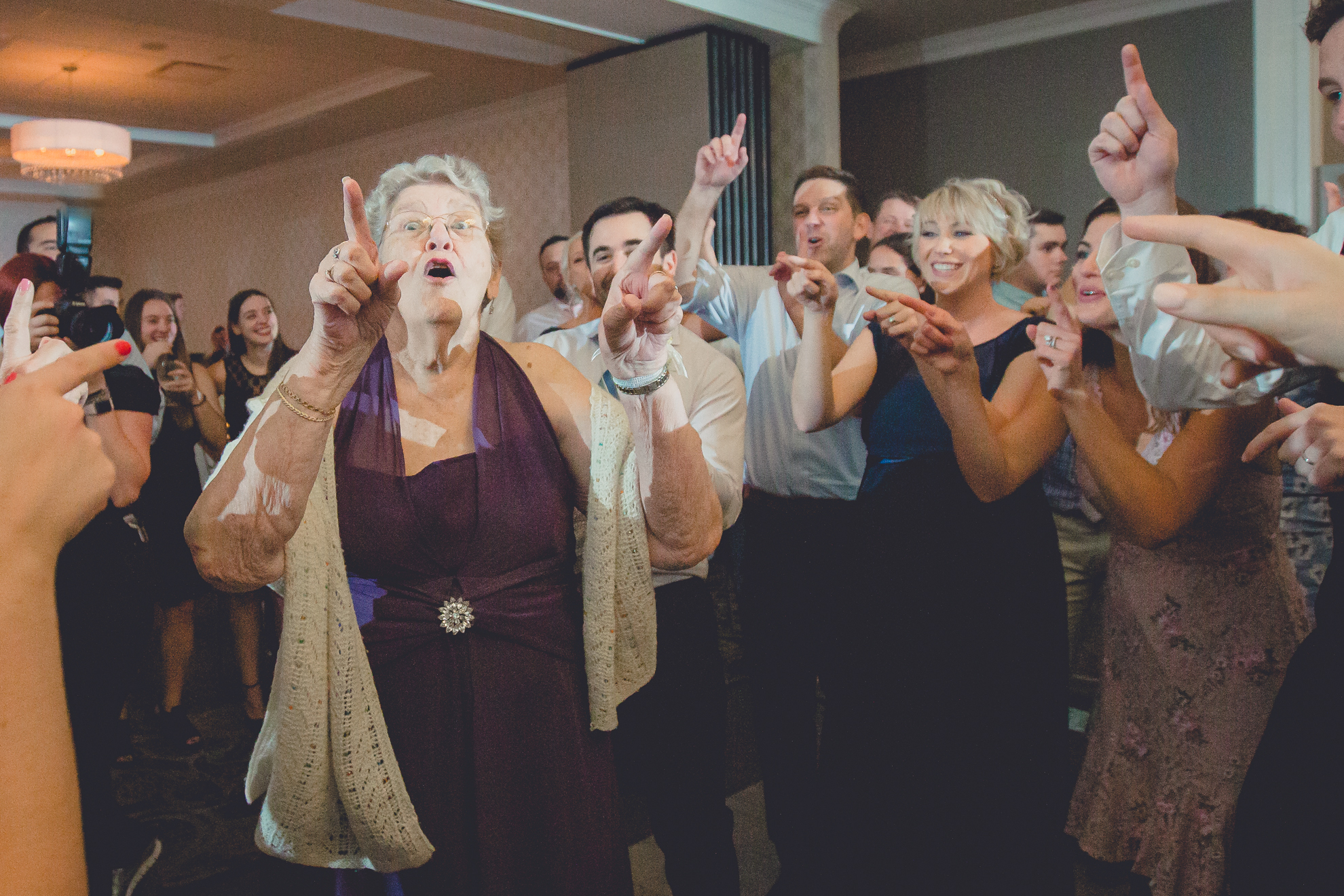 guests dance at wedding reception at Niagara Falls Country Club in Lewiston, NY