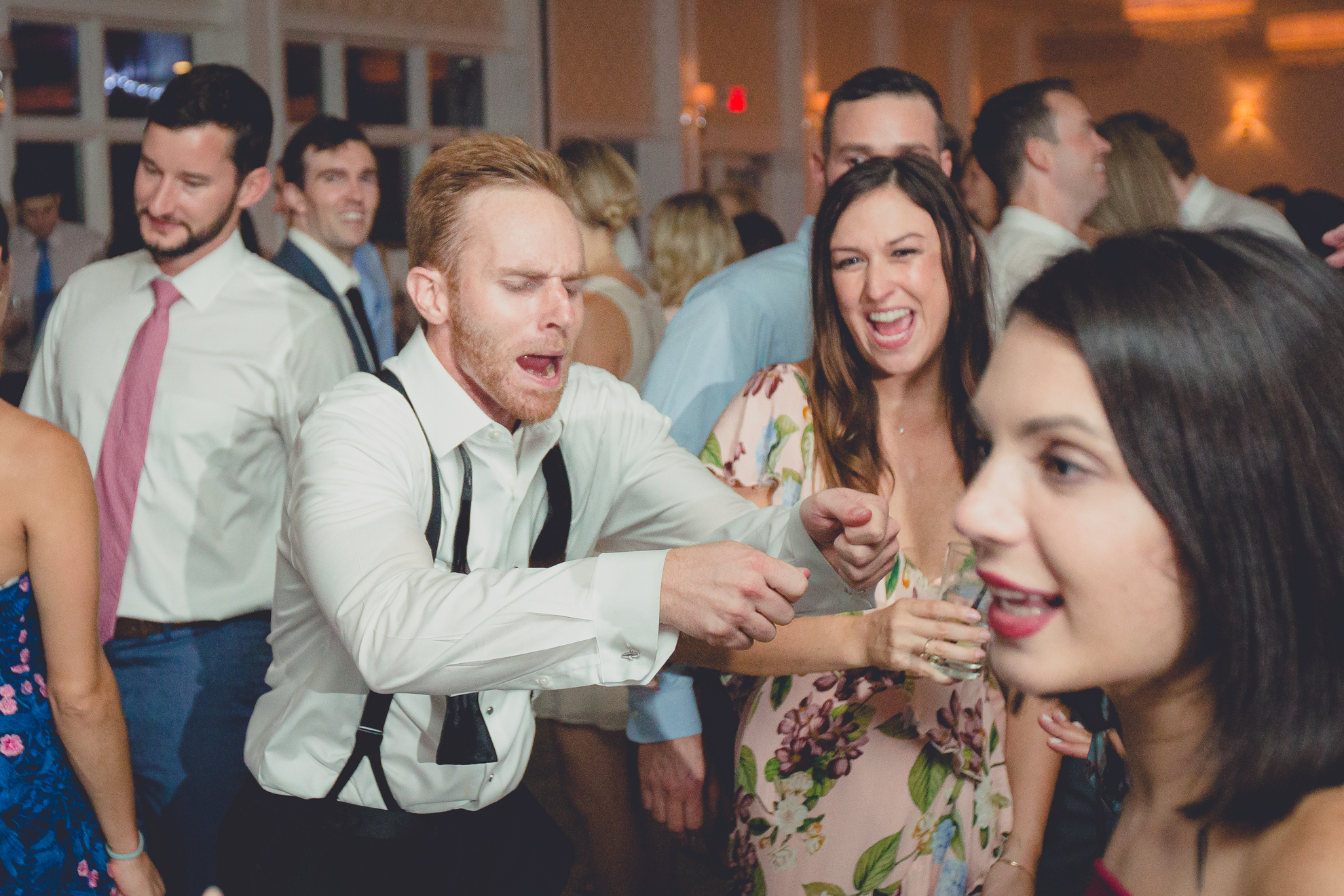 guests dance at wedding reception at Niagara Falls Country Club in Lewiston, NY