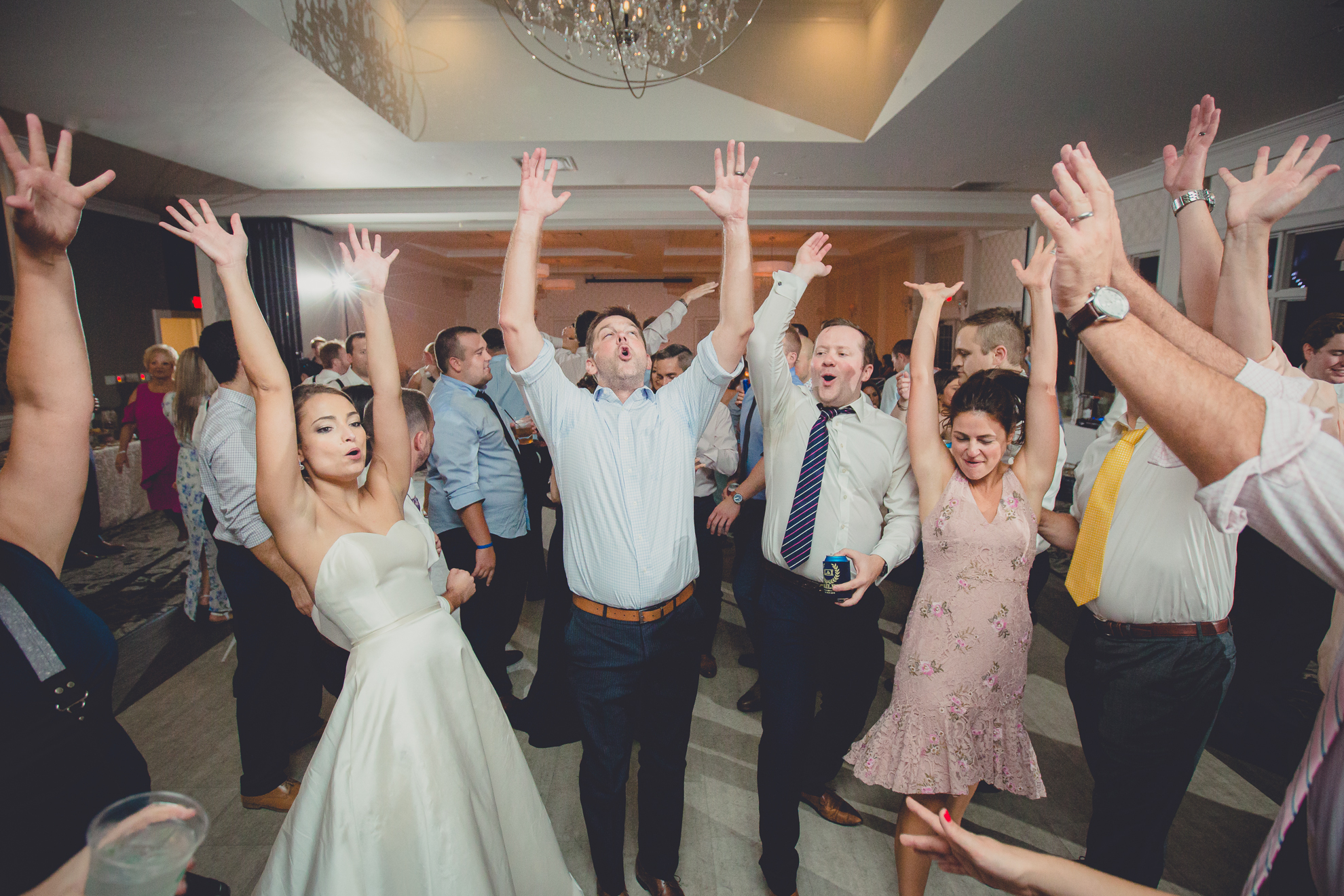 guests dance at wedding reception at Niagara Falls Country Club in Lewiston, NY